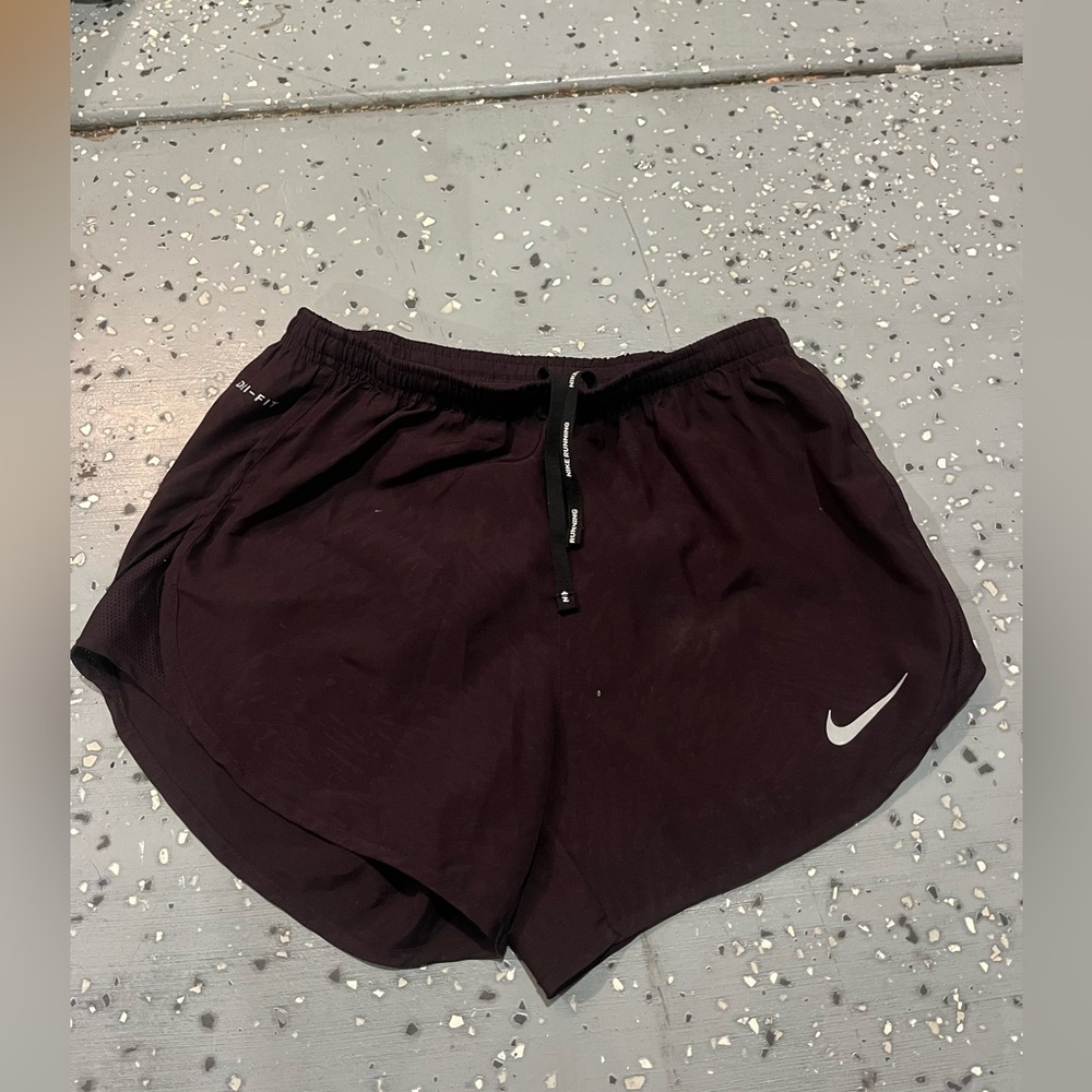 Dark purple Nike running shorts. Size: xs